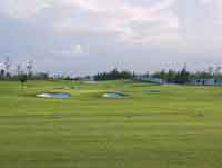 Golf course displaces farmers, taints water