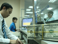 Vietnamese dong rate up, dollar edges higher